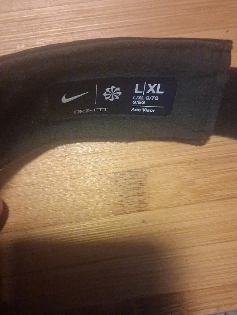 Nike Black Visor with Silver Swoosh L/Xl